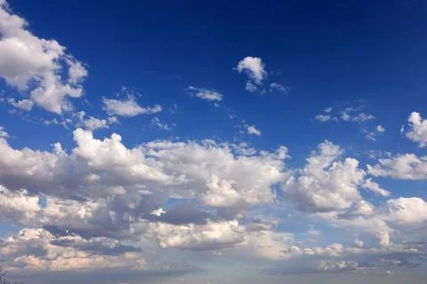 Low clouds at sunset on sunny day Stock Photos