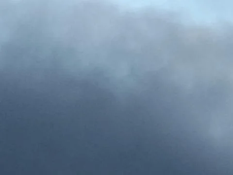 Low Dark Cloud Layer in Overcast Sky Фото