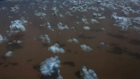 Low dark clouds over the Sahara Desert seen from 37000'  Stock Footage 184711308