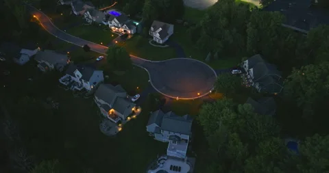 Low-density two story private homes at night. Rural street cul-de-sac dead end Stock Footage 249957452
