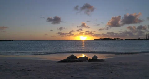 Low dolly Beach sunset waves Aruba empty baby beach Stock-Footage 130324962