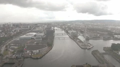 Low dolly forward drone shot over river Clyde Glasgow Scotland Stock Footage 158977458