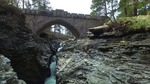 Low Drone Aerial Flying Under Bridge at Linn of Dee Stock Footage 81718562