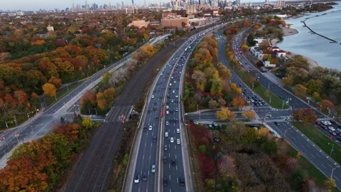 Low Drone Flight 4K Over Cars Road in Toronto, Canada Stock Footage 254384356