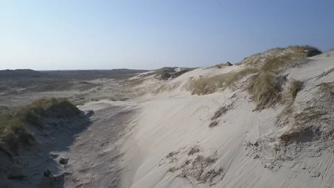 Low drone flight almost touching huge sand dunes Stock Footage 87314966