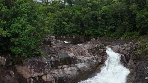 Low Drone Flight Over a 3-Meter Waterfall in Chu Yang Sin, Vietnam Stock Footage 343806611