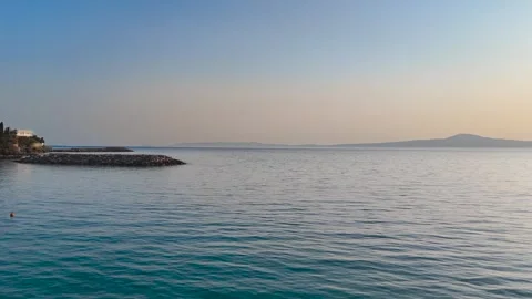 Low Drone Flight Over Calm Mediterranean Sea at Sunset Stock-Footage 334631963