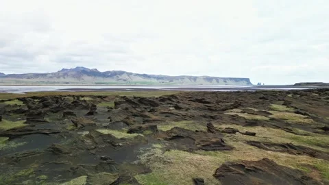 Low drone flight over moss covered lava field Iceland 4K Video stock 343869795