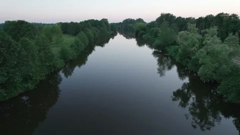 Low drone flight over the river at sunset. Drone Shot 4K. Stock Footage 201745741