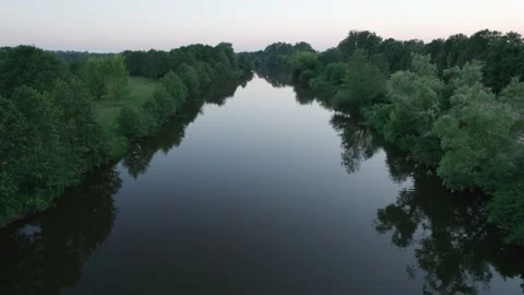 Low drone flight over the river at sunset. Drone Shot 4K. Stock Footage 201745824