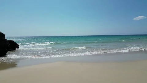 Low drone flight over a sandy beach in Hawaii Stock-Footage 347825784