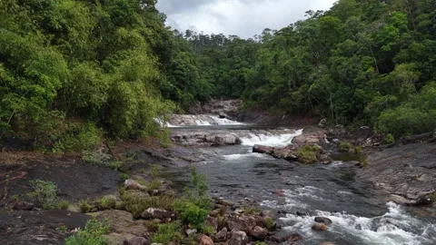 Low Drone Flight Over a Shallow Rocky Cascade in Chu Yang Sin, Vietnam Stock Footage 343806657