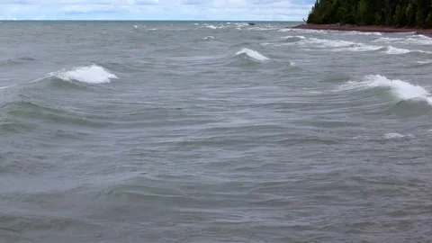 Low drone flight over surf at Sunset beach Stock Footage 295907193