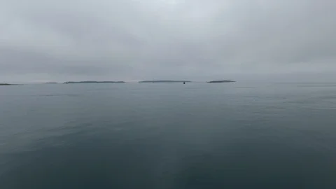 Low drone flight at sea gets close to bouy Video stock 127002841