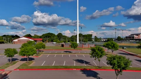 Low drone flight toward communications tower Stock Footage 207524463