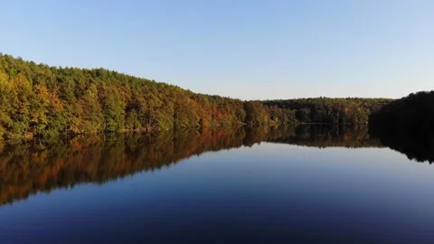 Low drone flyover over autumn lake in Brandenburg, Germany Stock Footage 143399536