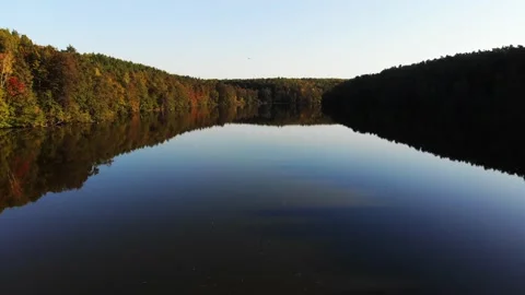 Low drone flyover over autumn lake in Brandenburg, Germany Stock Footage