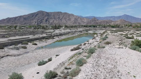 Low Drone Orbit Over Desert Shores Marina with San Jacinto Mountains Stockbeeldmateriaal 332682873