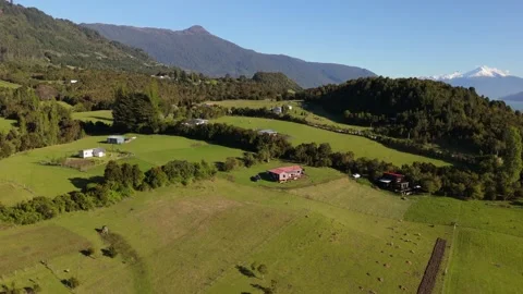 Low Drone Parallax Flight Over Rural Mountain Valley and Fjord 動画素材 334659235
