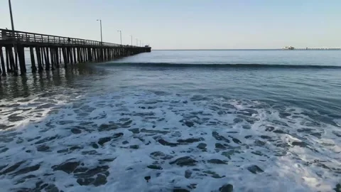 Low Drone Pass Over Waves Breaking with Pier - Early morning Stock-Footage 276198762