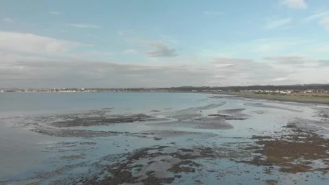 Low Drone Shot Over Ayr Bay Tidal Flats Looking Towards Seafield, Scotland 스톡 동영상 336707974