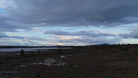 Low Drone Shot over Marsh During Evening Clouds in Maine Stock Footage 287763747