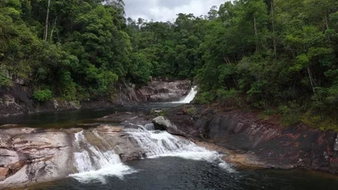 Low Drone View of a Wide Waterfall and Pool in Chu Yang Sin, Vietnam Stock Footage 343806631