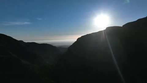 Low Evening Sun Behind Mountain with Coastline in Distance – Gran Canaria Stock Footage 309949151
