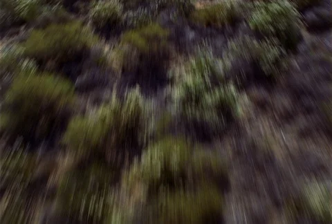 Low, fast flight over rough, arid terrain Stock Footage 86884227