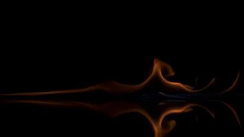 Low fire on a black background. Stock Photos