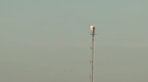Low flame on Flare Stack of Oil Refinery Stock Footage 1046605