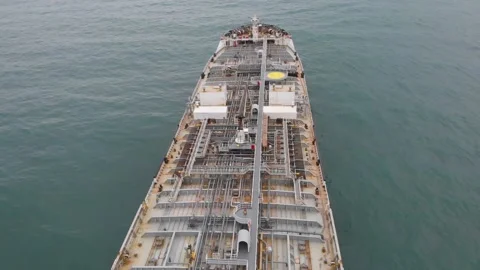 Low flight above the deck of an oil tanker at anchor. Stock Footage 140272279