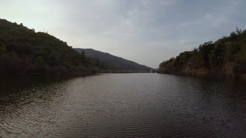 Low flight above lake 스톡 동영상 107877268