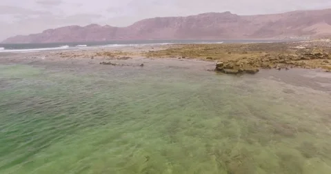 Low  flight above Ocean and reef Video stock 68284297