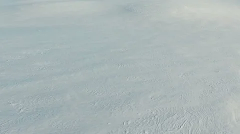 Low flight above snow fields in winter, aerial panoramic view. Video stock 67758969