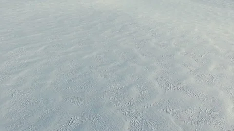 Low flight above snow fields in winter, aerial panoramic view. Video stock 67759040