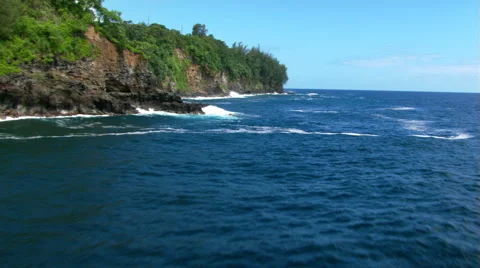 Low flight along shoreline cliffs in Hawaii Stock Footage 59245145