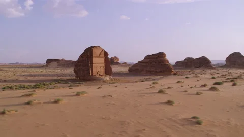 Low flight and circel Tomb of Lihyan, AlUla, Saudi Arabia. Aerial 4K, sunrise. Stock Footage 196828144