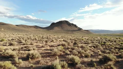Low Flight in the Desert Approaching Mining Ruins in Nevada Desert - Aerial Stock Footage 198459876
