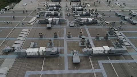 Low flight forward over factory roof Stock Footage 80291779