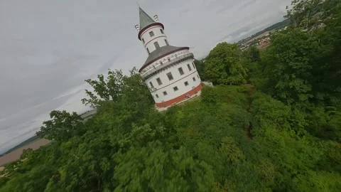 Low flight FPV drone cinematic over Humprecht Castle through tree canopy Stock Footage 316493478