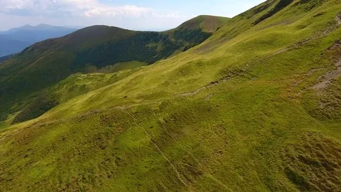 Low flight over an amazing mountain range Stock Footage 83973993