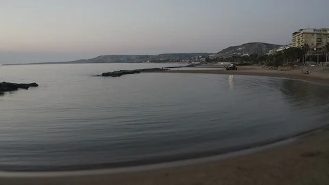 Low flight over a beach before the sunrise Stock Footage 120584307