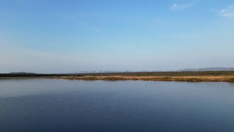 Low Flight Over Calm Lake, Newfoundland Stock Footage 253407985