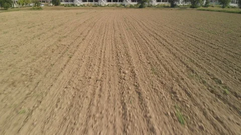 Low flight over dirt and soil Stock Footage 115727181