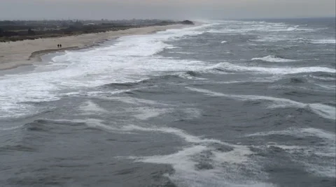Low flight over foaming gray waves near Jones Beach on Long Island, New York. Stock Footage 59172826