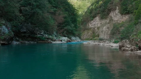 Low flight over fresh cold mountain river at sunny summer morning. Stock Footage 119790301