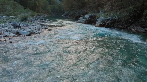 Low flight over fresh cold mountain river at sunny summer morning. Stock Footage 119790318