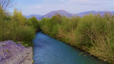 Low Flight Over a Fresh Cold Mountain River on a Sunny Summer Morning.  Stock Footage 239165192