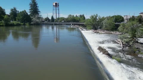 Low flight over Idaho Falls waterfall dam on Snake River 스톡 동영상 280522752